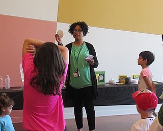 Neighbors | Jessica Harker .Children's librarian Rhonda Monroe explained a number of crafts to children and their families gathered at the Austintown library June 10 for the first DIY Day event.