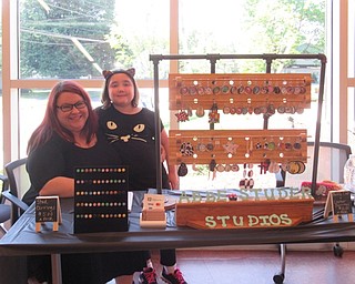 Neighbors | Jessica Harker .Abbe Studet and her step-daughter Miley were present at the Michael Kusalaba library for the first Craft and Trunk sale hosted by the Friends of the Library.