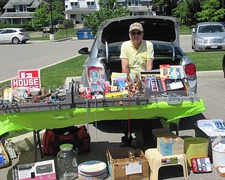 Neighbors | Jessica Harker .James Chizmar sold items from his trunk in the Michael Kuslaba library parking lot for the first Craft and Trunk sale.