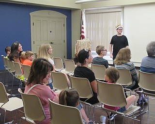 Neighbors | Jessica Harker .Audience members participated in a performance of Rumplestiltskin at the Boardman library on June 27.