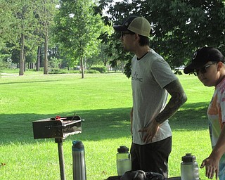 Neighbors | Jessica Harker .Justin Edwards with the Mahoning Valley Disc Golf Association ran the Boardman Park's new Disc Golf Camp on June 27.
