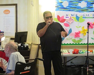 Neighbors | Jessica Harker .Singer Michael Angelo Prisco performed a number of Frank Senatra and Dean Martin songs for residents of Poland Sunrise July 1.