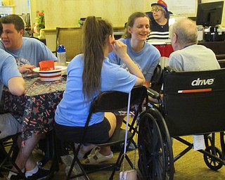 Neighbors | Jessica Harker .American and Irish students from the Mahoning Valley Ulster project met with residents of Poland Sunrise July 1 celebrating the Fourth of July.