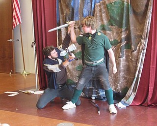 Neighbors | Jessica Harker .Actors Brady Bizon as Thor and Daniel Gordiejew as Loki acted out a scene from Legends of Asgard at the Michael Kusalaba library July 16.