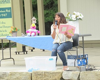Neighbors | Jessica Harker.Anne-Marie Turner read to children gathered with their families at the Boardman Park's Preschoolers in the Park event.