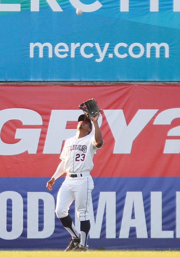 Scrappers' Billy Wilson catches a fly ball during their game against the Spikes at Eastwood Field on Thursday night. EMILY MATTHEWS | THE VINDICATOR