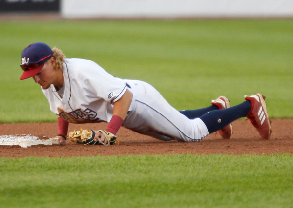 Scrappers' Raynel Delgado dives into second to make the out during their game against the Spikes at Eastwood Field on Thursday night. EMILY MATTHEWS | THE VINDICATOR
