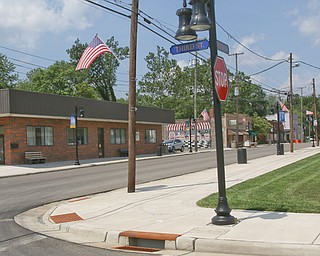 Future plans for the village of Lowellville's development call for condos to eventually be built along the corner of Third and East Water streets, which runs parallel to the Mahoning River. 