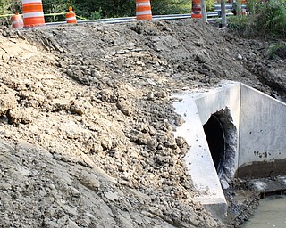 This is a culvert on Kinsman Pymatuning Road in Kinsman that was washed out July 20 by water flowing into it from the north. The Trumbull County Engineer’s office was working on it Monday.