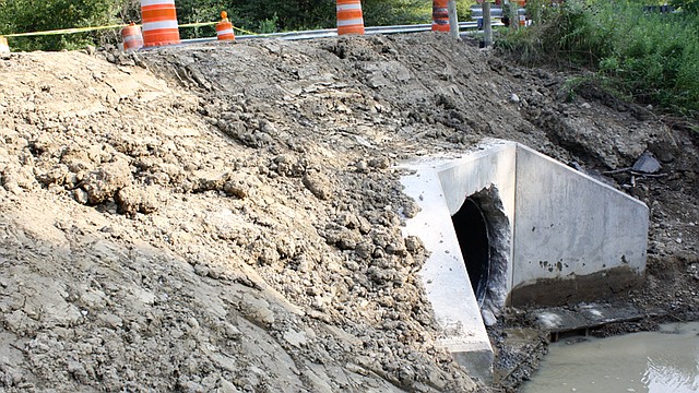This is a culvert on Kinsman Pymatuning Road in Kinsman that was washed out July 20 by water flowing into it from the north. The Trumbull County Engineer’s office was working on it Monday.