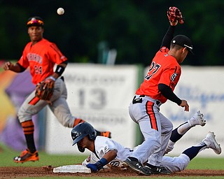 NILES, OHIO - JULY 30, 2019: Scrappers' Brayan Rocchio steals second base after Aberdeen's Joey Ortiz misplayed the ball in the third inning of their game, Tuesday night at Eastwood Field. DAVID DERMER | THE VINDICATOR