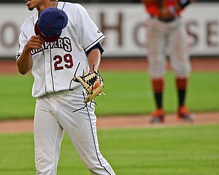 NILES, OHIO - JULY 30, 2019: Scrappers starting pitcher Carlos Vargas reacts after striking out Aberdeen's Kyle Stowers in the fourth inning of their game, Tuesday night at Eastwood Field. DAVID DERMER | THE VINDICATOR