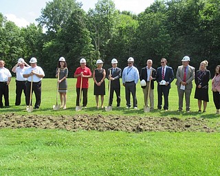Neighbors | Jessica Harker .Representatives from local fire deprtments and members of the MCCTC school board gathered at the ground breaking site for the school's new Fire Tower and Training Facility July 9.