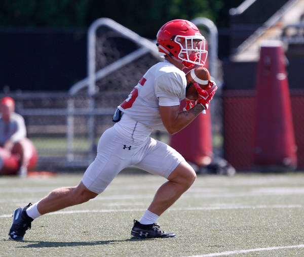 C.J. Charleston catches a kick during YSU's scrimmage Saturday morning at Stambaugh Stadium. EMILY MATTHEWS | THE VINDICATOR