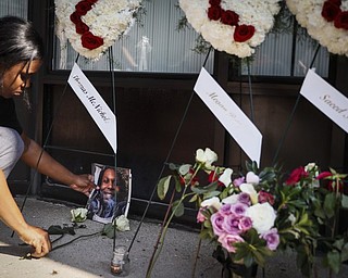 A memorial takes shape outside the scene of Sunday’s mass shooting in Dayton, where a gunman in body armor opened fire in a popular entertainment district, killing nine people, including his sister, and wounding dozens of others before he was quickly slain by police. The Mahoning Valley’s Democratic leaders want President Donald Trump to take action and not just talk about seeking bipartisan cooperation to strengthen gun laws.