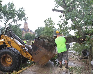 William D. Lewis the vindicator Warren City crews work at removing  downed tree on hte West Mrket St Bridge i in Warren after fast moving storm hit Tuesday 8-6-19 afternoon.