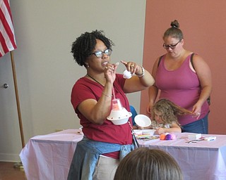 Neighbors | Jessica Harker .Rhonda Monroe, a children's librarian at the Michael Kusalaba library, hosted a crafting event for school-age children on July 2 for the Summer Reading Program.