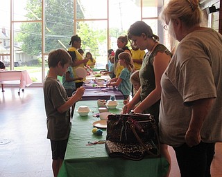 Neighbors | Jessica Harker .Community members gathered at the Michael Kuslaba library for the first Space Invader Crafting event.