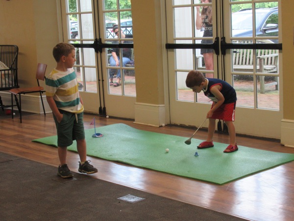 Neighbors | Jessica Harker .Children played indoor mini golf at the Poland library on Aug, 1 during the annual Ice Cream Bash.