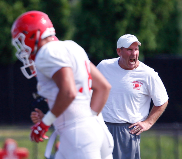Coach Bo Pelini yells to his players during YSU's scrimmage on Saturday. EMILY MATTHEWS | THE VINDICATOR