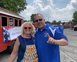 Neighbors | Submitted.Bruce Shepas, the chairman of the Austintown Fourth of July parade, posed with Joanna Parker from West Side Tire, the winner of the parade's float competition.