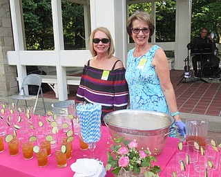 Neighbors | Jessica Harker .Volunteers worked the drink station at the Friends of Fellows Riverside Gardens annual Garden Party Fundraiser July 26.