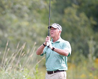 Larry Letcher watches his ball during the Greatest Golfer of the Valley tournament at Mill Creek Golf Course on Friday. EMILY MATTHEWS | THE VINDICATOR