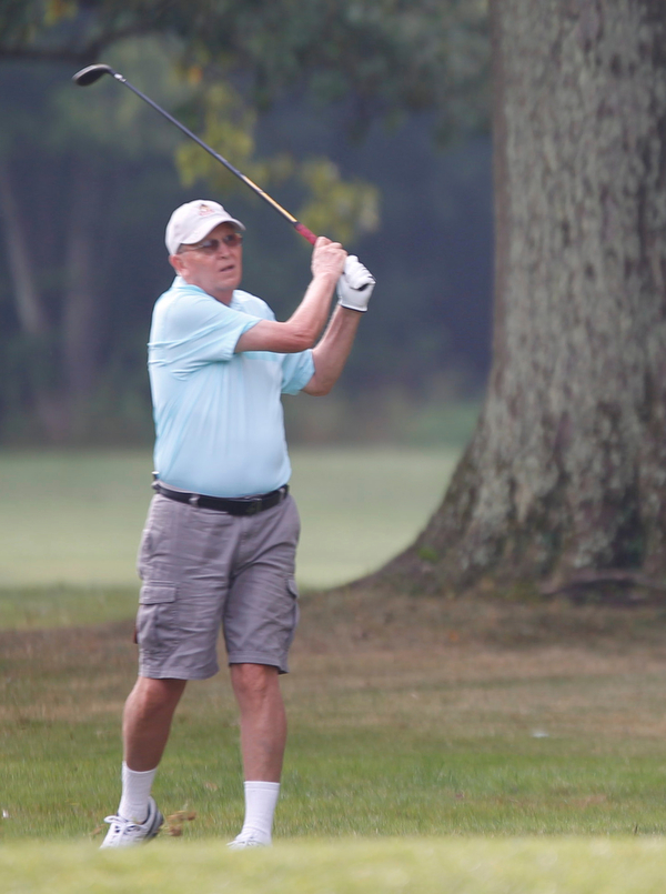 Robert Brown hits the ball during the Greatest Golfer of the Valley tournament at Mill Creek Golf Course on Friday. EMILY MATTHEWS | THE VINDICATOR