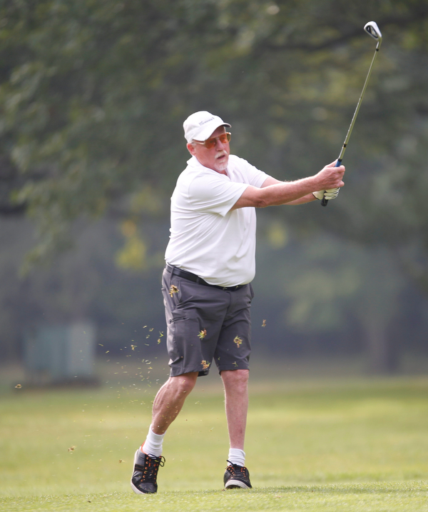 Leonard Schneider hits the ball during the Greatest Golfer of the Valley tournament at Mill Creek Golf Course on Friday. EMILY MATTHEWS | THE VINDICATOR
