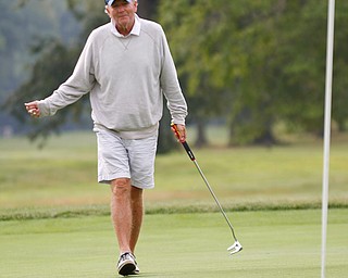 Dave Nagy reacts to hit putt that just missed the hole during the Greatest Golfer of the Valley tournament at Mill Creek Golf Course on Friday. EMILY MATTHEWS | THE VINDICATOR