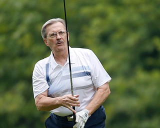 Phil Regano watches his drive during the Greatest Golfer of the Valley tournament at Mill Creek Golf Course on Friday. EMILY MATTHEWS | THE VINDICATOR