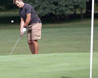 Dane Stilgenbauer hits the ball during the Greatest Golfer of the Valley tournament at Mill Creek Golf Course on Friday. EMILY MATTHEWS | THE VINDICATOR