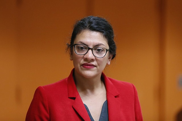 U.S. Rep. Rashida Tlaib, D-Mich., listens to a question from a constituent in Wixom, Mich., Thursday.