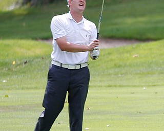 Joe Cilone reacts after hitting the ball during the Farmers National Bank Greatest Golfer of the Valley tournament at Youngstown Country Club on Saturday. EMILY MATTHEWS | THE VINDICATOR