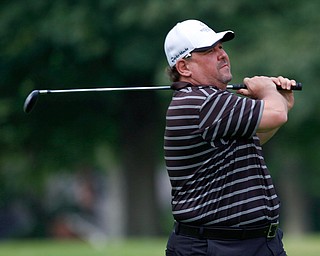 Paul Harris watches his drive during the Farmers National Bank Greatest Golfer of the Valley tournament at Youngstown Country Club on Saturday. EMILY MATTHEWS | THE VINDICATOR