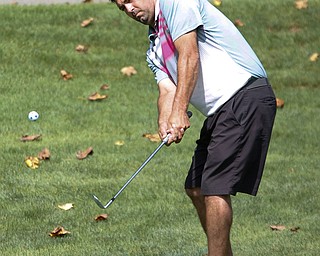 Thom Begeot hits the ball during the final day of the Greatest Golfer tournament at the Lake Club on Sunday. EMILY MATTHEWS | THE VINDICATOR