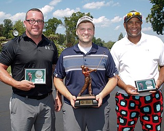 Men's 13-15 Handicap Division first place finisher Bradley Koch, center, with a final score of 244, second place finisher Joshua Marsh, left, with a final score of 245, and third place finisher Cham Kahari, with a final score of 253. EMILY MATTHEWS | THE VINDICATOR