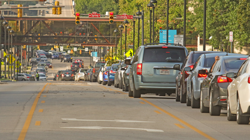 Cars sit in line on Wick Avenue Avenue on Youngstown State University’s campus Monday morning before the first day of classes. Construction restricting portions of Fifth Avenue has made navigating the campus more difficult.