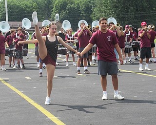 Neighbors | Jessica Harker.Members of the Boardman Color Gaurd danced with band members during the performance of their Motown medley on Aug. 16 outside of Boardman High School.