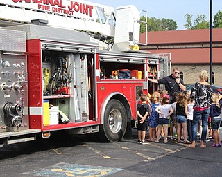 Neighbors | Abby Slanker.During Canfield PTA’s Kindergarten Safety Day on Aug. 17, the Canfield Fire Department covered fire safety and described the firefighter’s gear and equipment they use during a fire and the students were also able to get an up close look at the fire truck.