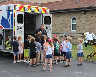 Neighbors | Abby Slanker.A Canfield Fire Department EMT showed incoming kindergartens the ins and outs of an ambulance during Canfield PTA's Kindergarten Safety Day on Aug. 17.