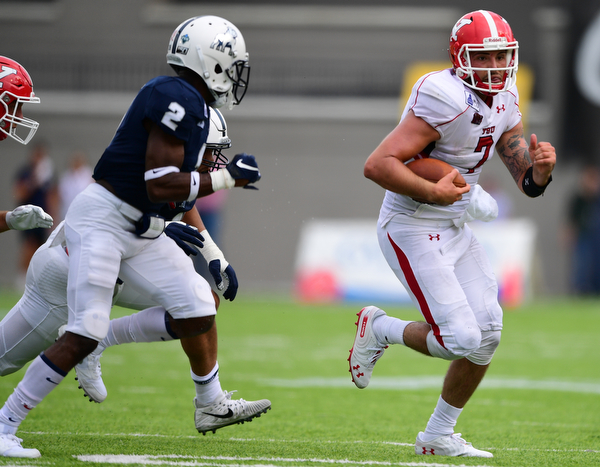 MONTGOMERY, ALABAMA - AUGUST 24, 2019: Youngstown State's Nathan Mays runs the ball away from Samford's Coutrell Plair during the first half of their game, Saturday afternoon. DAVID DERMER | THE VINDICATOR