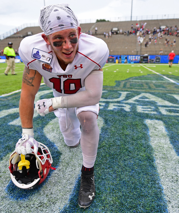 MONTGOMERY, ALABAMA - AUGUST 24, 2019: Youngstown State's Kyle Hegedus smiles while resting in exhaustion after defeating Samford, Saturday afternoon. DAVID DERMER | THE VINDICATOR