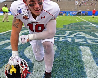 MONTGOMERY, ALABAMA - AUGUST 24, 2019: Youngstown State's Kyle Hegedus smiles while resting in exhaustion after defeating Samford, Saturday afternoon. DAVID DERMER | THE VINDICATOR