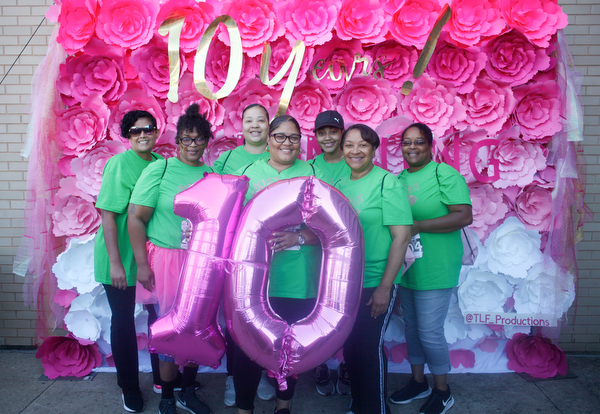 From left, Olivia Jennings, Lisa Maiden, Terah Leonard, and Tameka Kamryn Gibson, Kim Harris, and Tuniesha Gibson, all of Youngstown and part of the Candy Kisses team, pose for a photo outside the Covelli Centre before the start of the 2019 Panerathon on Sunday morning. EMILY MATTHEWS | THE VINDICATOR
