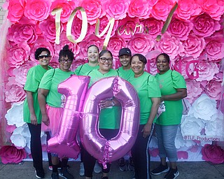 From left, Olivia Jennings, Lisa Maiden, Terah Leonard, and Tameka Kamryn Gibson, Kim Harris, and Tuniesha Gibson, all of Youngstown and part of the Candy Kisses team, pose for a photo outside the Covelli Centre before the start of the 2019 Panerathon on Sunday morning. EMILY MATTHEWS | THE VINDICATOR