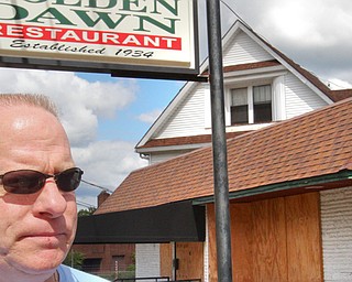 Johnny Naples, owner of the Golden Dawn, is preparing to reopen the iconic North Side restaurant on Logan Avenue, which has been in his family for more than eight decades.
