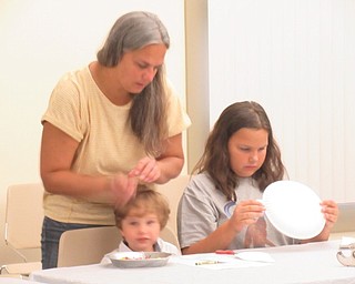 Neighbors | Jessica Harker.Children worked on kangaroo themed crafts at the Boardman library's monthly Family Story Time event August 7.