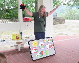 Neighbors | Jessica Harker .Marilyn Williams, a Mill Creek MetroParks Naturalist, read to 2-3 year-olds at Fellows Riverside Gardens for the monthly Tales for Tots event.
