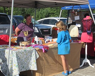 Neighbors | Jessica Harker .Community members gathered at Austintown Township Park August 19 to purchase items from local vendors at the weekly Austintown Farmers Market.